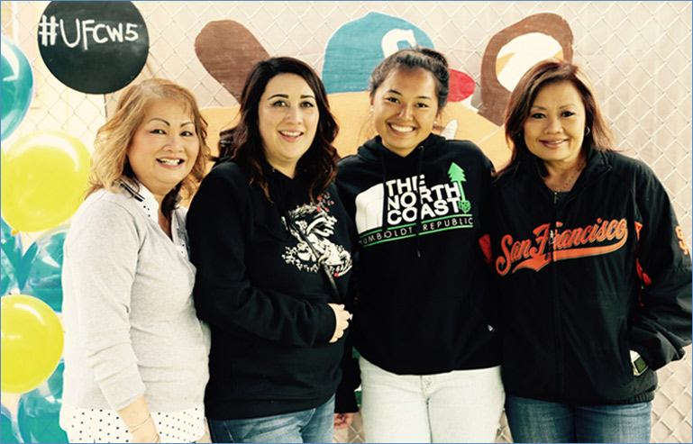 UFCW5 four women in front of a mural