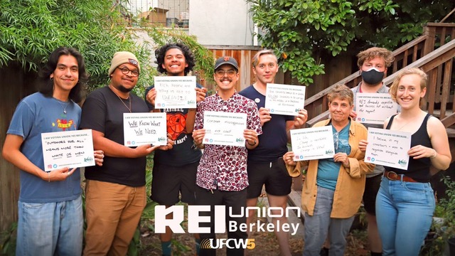 REI Union Berkeley members holding placards